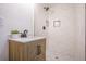 Modern bathroom featuring stylish tile work, a sleek vanity, and a rainfall shower at 3181 Pennington Sw Cir, Atlanta, GA 30354