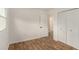 Bright bedroom with wood-look floors, closet, and ensuite access at 3181 Pennington Sw Cir, Atlanta, GA 30354