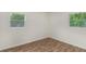 Sun-lit room with wood-look floors, offering a serene and neutral space at 3181 Pennington Sw Cir, Atlanta, GA 30354