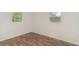 Sun-lit room with wood-look floors, offering a serene and neutral space at 3181 Pennington Sw Cir, Atlanta, GA 30354