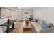 Finished basement featuring a living area with ample seating and a work desk at 3181 Pennington Sw Cir, Atlanta, GA 30354