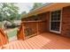Outdoor wood deck offering great views of the home's surrounding landscaped backyard at 3572 Stone Ridge Trl, Douglasville, GA 30134