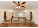 Open dining area with modern lighting, connecting two living areas at 3572 Stone Ridge Trl, Douglasville, GA 30134