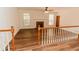 Living room with a fireplace, hardwood floors, and plenty of natural light at 3572 Stone Ridge Trl, Douglasville, GA 30134