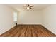 An empty Living Room with Hardwood flooring and a window at 3572 Stone Ridge Trl, Douglasville, GA 30134