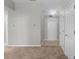 Inviting entryway with tile flooring and neutral wall color, offering a clean and modern aesthetic at 6416 Chestnut Glen Dr, Norcross, GA 30071