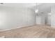 Bright living room with neutral paint and carpet, ready to be personalized and enjoyed at 6416 Chestnut Glen Dr, Norcross, GA 30071