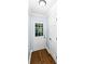 Entryway with tile flooring and a white exterior door with glass panes at 664 Somerset Dr, Lawrenceville, GA 30046