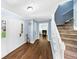 Bright foyer with hardwood floors leads to the staircase and living spaces, creating a welcoming entrance at 664 Somerset Dr, Lawrenceville, GA 30046