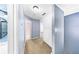 Hallway featuring neutral carpet and blue and white painted walls at 664 Somerset Dr, Lawrenceville, GA 30046