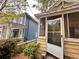 Image captures the home's exterior, showcasing siding, windows, and a glimpse of the surrounding greenery at 712 Garibaldi Sw St, Atlanta, GA 30310