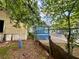 View of a narrow side yard with fence and the adjacent home at 712 Garibaldi Sw St, Atlanta, GA 30310