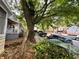 Picturesque street view featuring diverse homes, mature trees, and parked cars along a quiet road at 712 Garibaldi Sw St, Atlanta, GA 30310