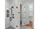 Contemporary bathroom showcases a glass-enclosed shower with black fixtures and modern tile, offering a luxurious bathing experience at 105 Georgia Se Ave # 6, Atlanta, GA 30312