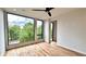 This bedroom has hardwood floors, recessed lighting and a large window with views of the city at 105 Georgia Se Ave # 6, Atlanta, GA 30312