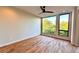 Bright bedroom featuring hardwood floors, large windows, and natural light at 105 Georgia Se Ave # 6, Atlanta, GA 30312