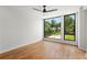 Bright bedroom boasts large windows with scenic views, hardwood floors, and ample natural light, creating a tranquil retreat at 105 Georgia Se Ave # 6, Atlanta, GA 30312