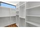 Walk-in closet offers ample storage space with custom shelving and organization system, enhancing functionality and convenience at 105 Georgia Se Ave # 6, Atlanta, GA 30312