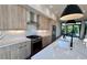 Bright kitchen featuring stainless steel appliances, marble countertops, and stylish light fixtures at 105 Georgia Se Ave # 6, Atlanta, GA 30312