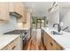 Spacious kitchen with modern cabinets, stainless steel appliances, and quartz countertops, offering style and functionality at 105 Georgia Se Ave # 6, Atlanta, GA 30312