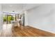 Open concept living area features hardwood floors, stainless steel appliances, and plenty of natural light, creating a welcoming atmosphere at 105 Georgia Se Ave # 6, Atlanta, GA 30312