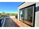 This rooftop deck has beautiful wood tiles and sliding glass door to small kitchen area at 105 Georgia Se Ave # 6, Atlanta, GA 30312