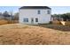 Large backyard with a well-maintained lawn and a privacy fence, perfect for entertaining at 165 Twin Lakes Dr, Covington, GA 30016