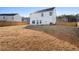 A spacious backyard enclosed by a wooden fence, offering privacy and room for outdoor activities at 165 Twin Lakes Dr, Covington, GA 30016
