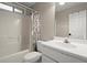 Functional bathroom with tub/shower, toilet, vanity, and sink at 4635 Rutledge Dr, Snellville, GA 30039