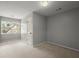Clean, carpeted bedroom with double closet and bright window at 4635 Rutledge Dr, Snellville, GA 30039
