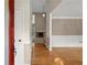 Inviting entryway boasting hardwood floors, decorative molding, and a view into the spacious living area at 4635 Rutledge Dr, Snellville, GA 30039