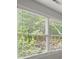 View from a window to the leafy and green exterior at 4635 Rutledge Dr, Snellville, GA 30039