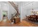 Grand foyer with staircase, hardwood floors, and elegant dining room in view at 4877 Registry Nw Ln, Kennesaw, GA 30152