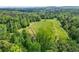 Expansive wooded acreage, perfect for building your dream home at 4877 Registry Nw Ln, Kennesaw, GA 30152