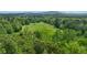 A beautiful landscape of lush greenery and wooded land at 4877 Registry Nw Ln, Kennesaw, GA 30152