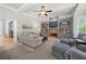 Cozy living room featuring a fireplace with built-in shelving and comfortable seating at 4877 Registry Nw Ln, Kennesaw, GA 30152