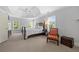 Spacious main bedroom features tray ceilings, a seating area and lots of natural light at 4877 Registry Nw Ln, Kennesaw, GA 30152