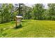 View of the beautiful property and surrounding lush greenery at 4877 Registry Nw Ln, Kennesaw, GA 30152