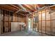 Unfinished basement with concrete floor, sink and exposed pipes, ready to be customized at 1551 Pharrs Rd., Snellville, GA 30078