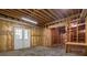 Unfinished basement with concrete floor, exposed ceiling and frame, ready to be finished your way at 1551 Pharrs Rd., Snellville, GA 30078