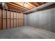 Unfinished basement with concrete floor and walls, exposed beams, ready for your customization at 1551 Pharrs Rd., Snellville, GA 30078