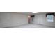 Finished basement area with carpet, windows, and closet doors at 1551 Pharrs Rd., Snellville, GA 30078