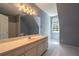 Bathroom with a large vanity and a window at 1551 Pharrs Rd., Snellville, GA 30078