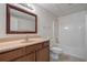 Well-lit bathroom featuring a vanity with granite counter top and shower and tub combo at 1551 Pharrs Rd., Snellville, GA 30078