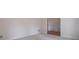Cozy bedroom featuring neutral carpet, white trim and view to the doorway at 1551 Pharrs Rd., Snellville, GA 30078