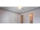 Bedroom featuring carpet flooring and a view into the bathroom at 1551 Pharrs Rd., Snellville, GA 30078