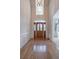 Stately foyer featuring a high ceiling, grand door and hardwood flooring at 1551 Pharrs Rd., Snellville, GA 30078