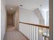 Hallway with recessed lights, chandelier and view to staircase at 1551 Pharrs Rd., Snellville, GA 30078