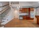 Spacious kitchen with hardwood floors, custom cabinets, and stainless steel appliances at 1551 Pharrs Rd., Snellville, GA 30078