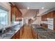 Kitchen with granite counters, stainless appliances, central island, and open layout at 1551 Pharrs Rd., Snellville, GA 30078